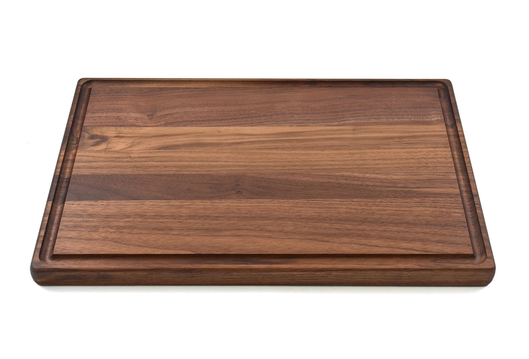 Custom engraved walnut butcher block with juice groove by 3Blades Maker Lab