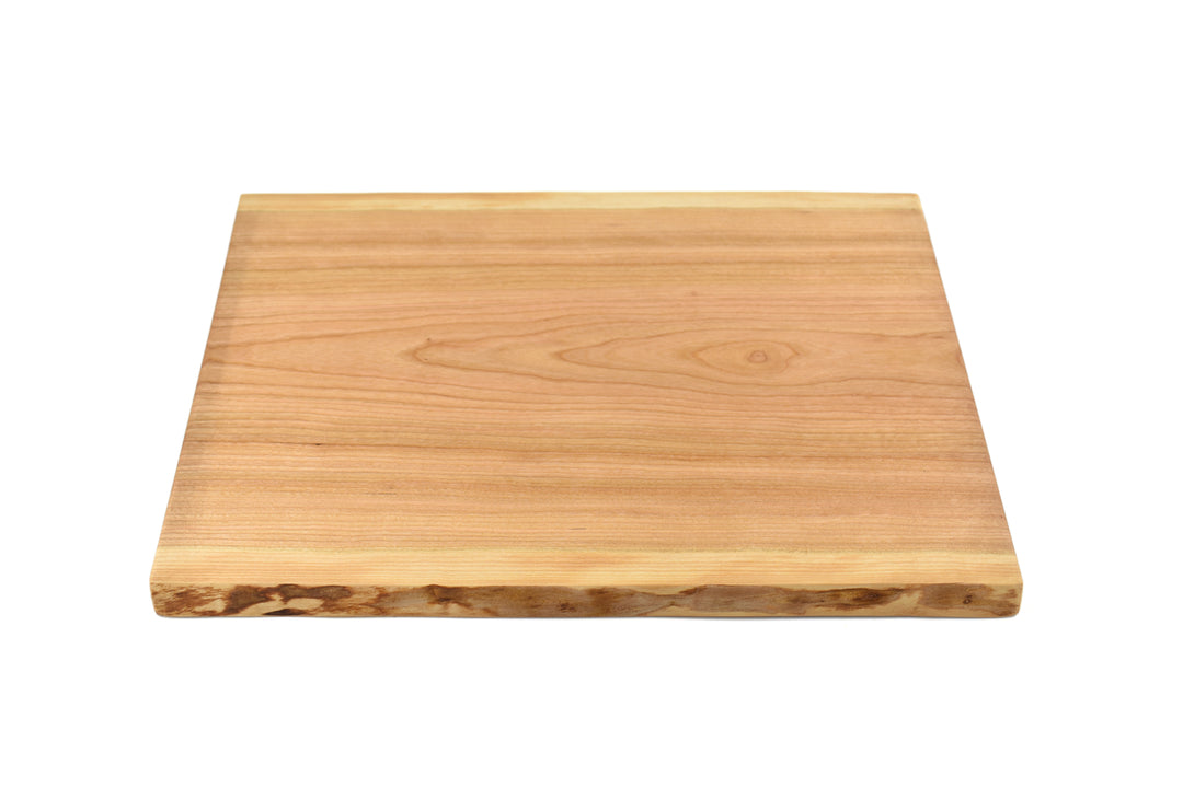 Live edge cherry charcuterie board by 3Blades Maker Lab