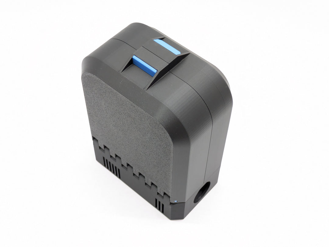 Closed charger-version case standing upright, black with a blue latch