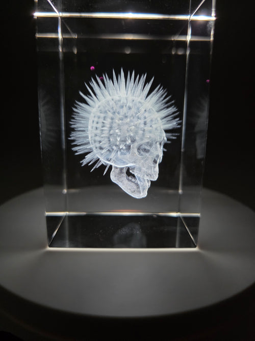 3D laser engraved crystal block with intricate detail on LED light base