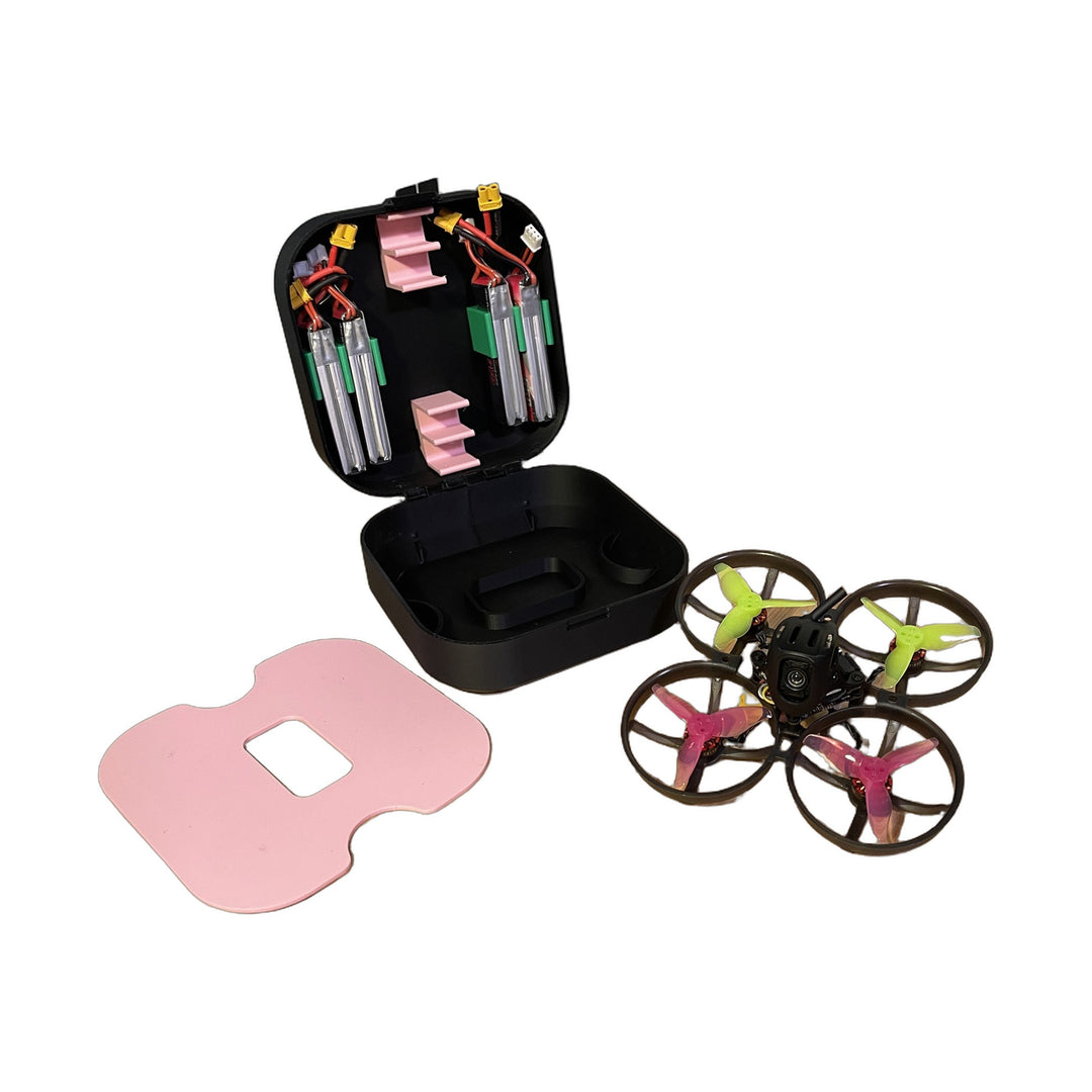 Open Mobula8 Classic case with its pink insert lifted out and the Mobula8 whoop sitting beside it