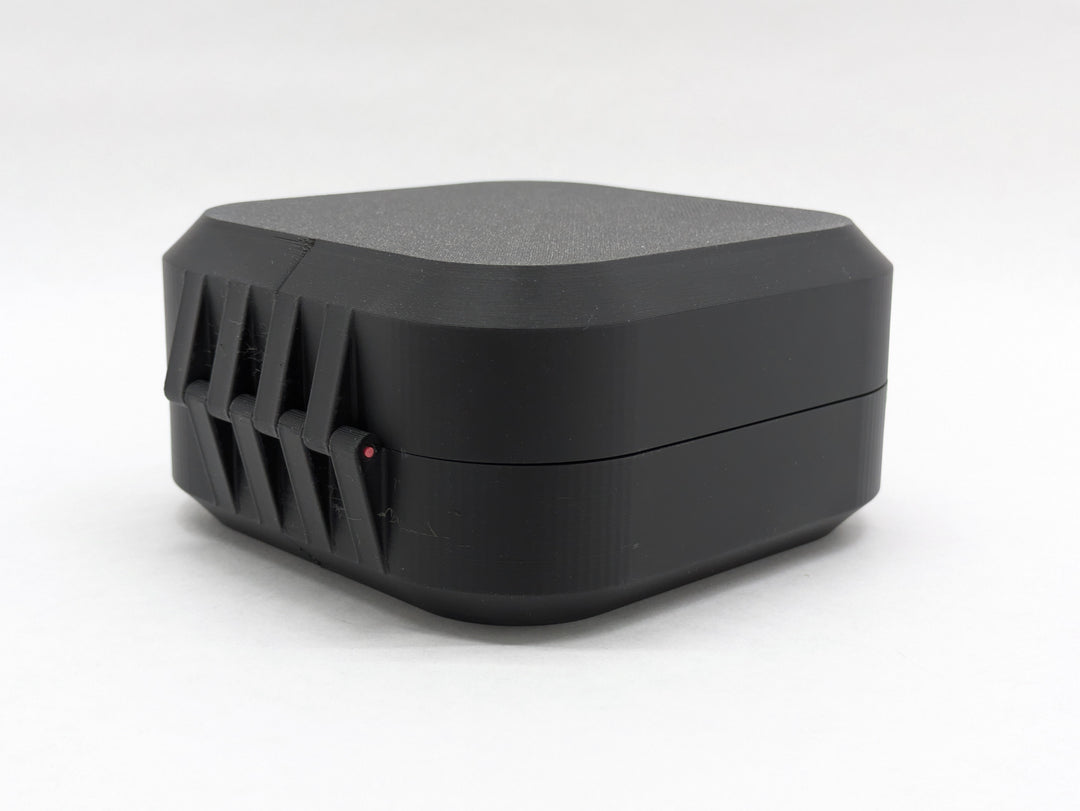 Closed black Elite case from the back, showing the printed hinge