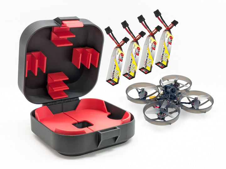 3D printed Mobula8 Freestyle Elite drone case open, black with red Freestyle hatch inserts, shown with an M8 Freestyle whoop and four batteries