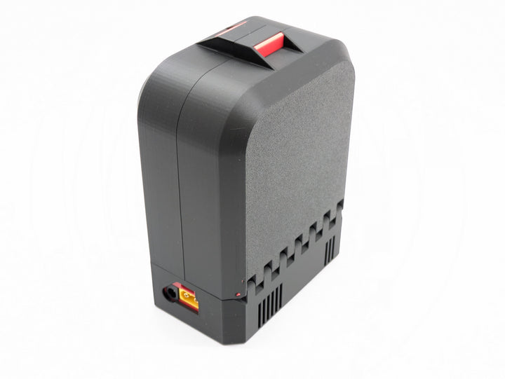Closed 3D printed whoop case in black and red, showing the printed filament hinge and top latch