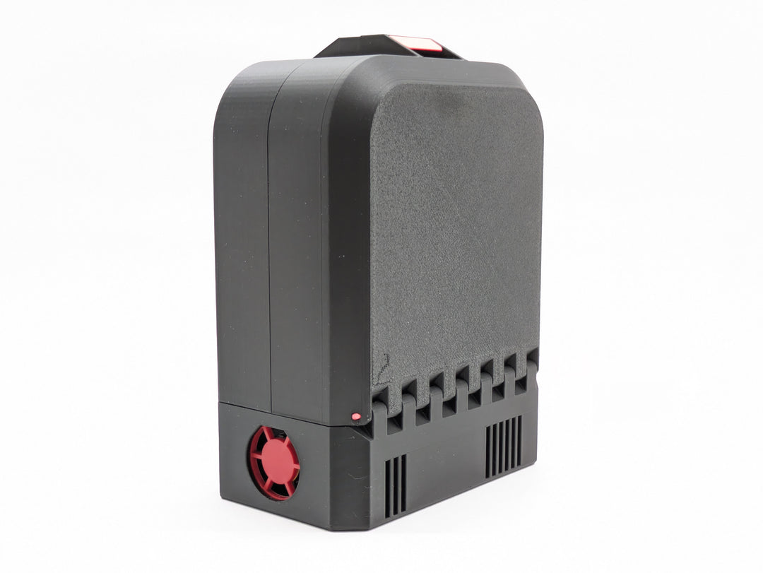 Closed printed FPV case with vent slots and the charger fan cutout at the base