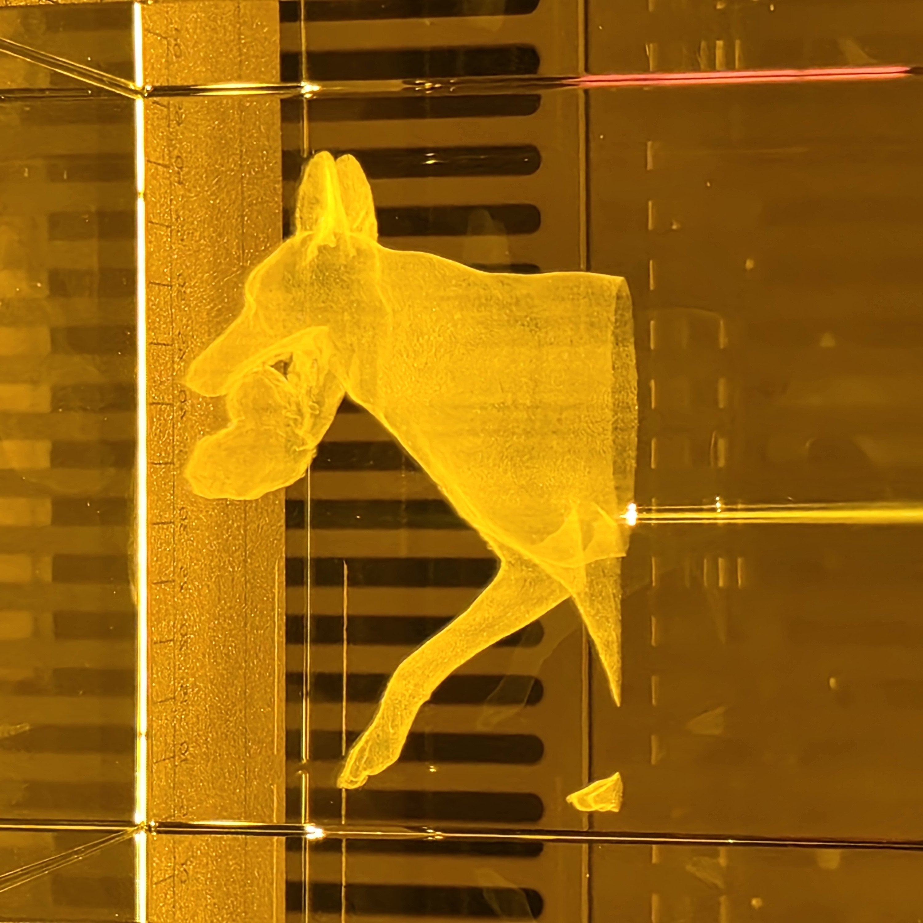 Crystal being laser engraved